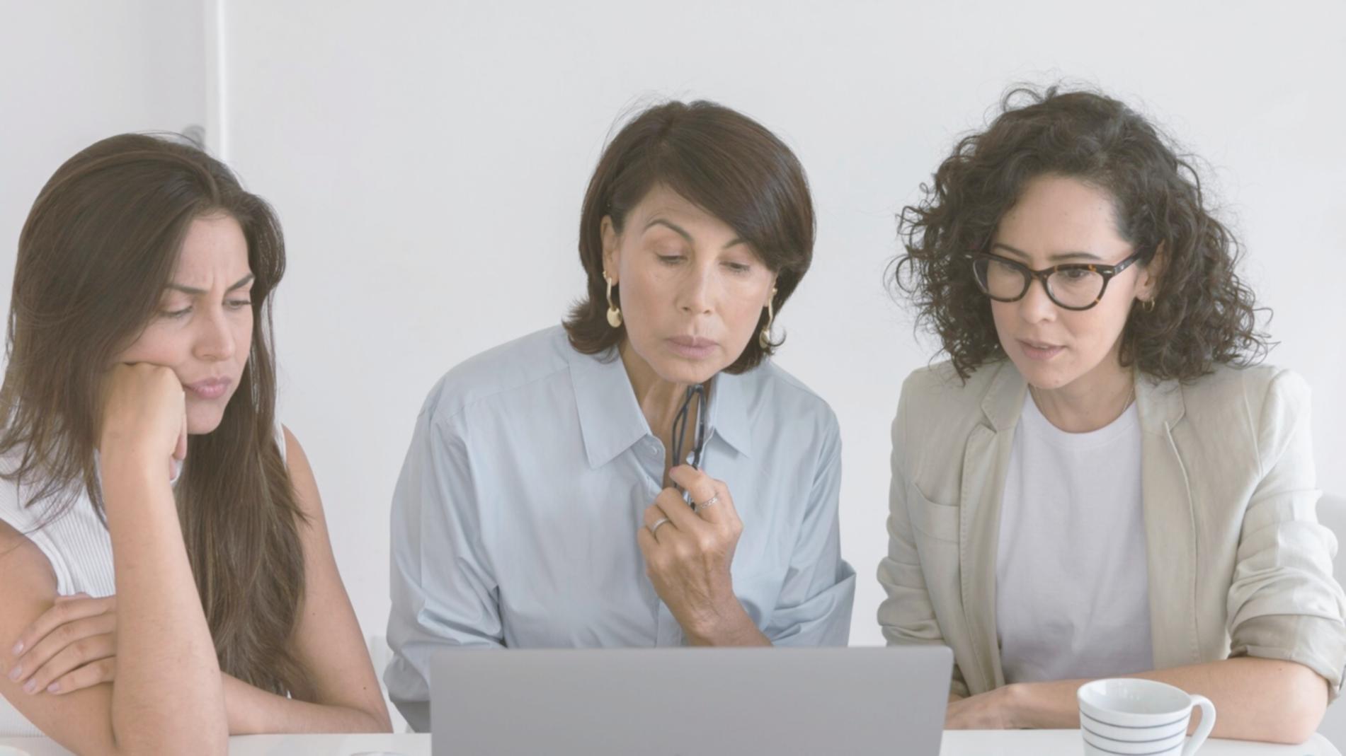 Financial professionals analyzing market data and investment trends