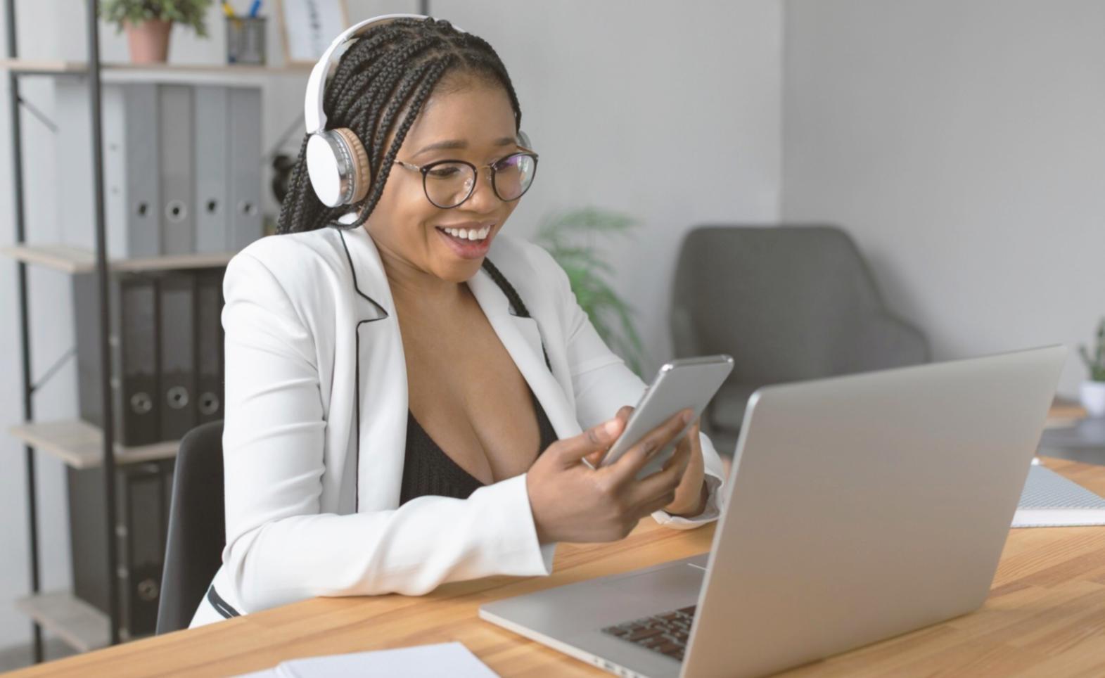 Close-up of hands analyzing financial charts and graphs on tablet