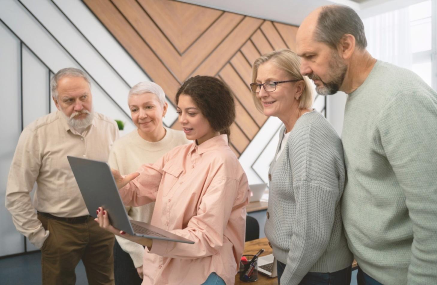 Students collaborating on financial data analysis in modern learning environment